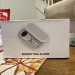 White Bedwetting Alarm Potty Training Device For Unisex. Fixed Price $25.00.