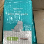 Pack - Amazon Basics Ultra Thin Pads With Wings Long Super 32 Ct Each. Fixed Price $13.75.