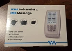 Tens Pain Relief & Ems Massage Unit Model DJ-E2A0 New/sealed. Fixed Price $24.95.